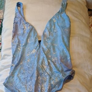 FashionNova holographic body suit